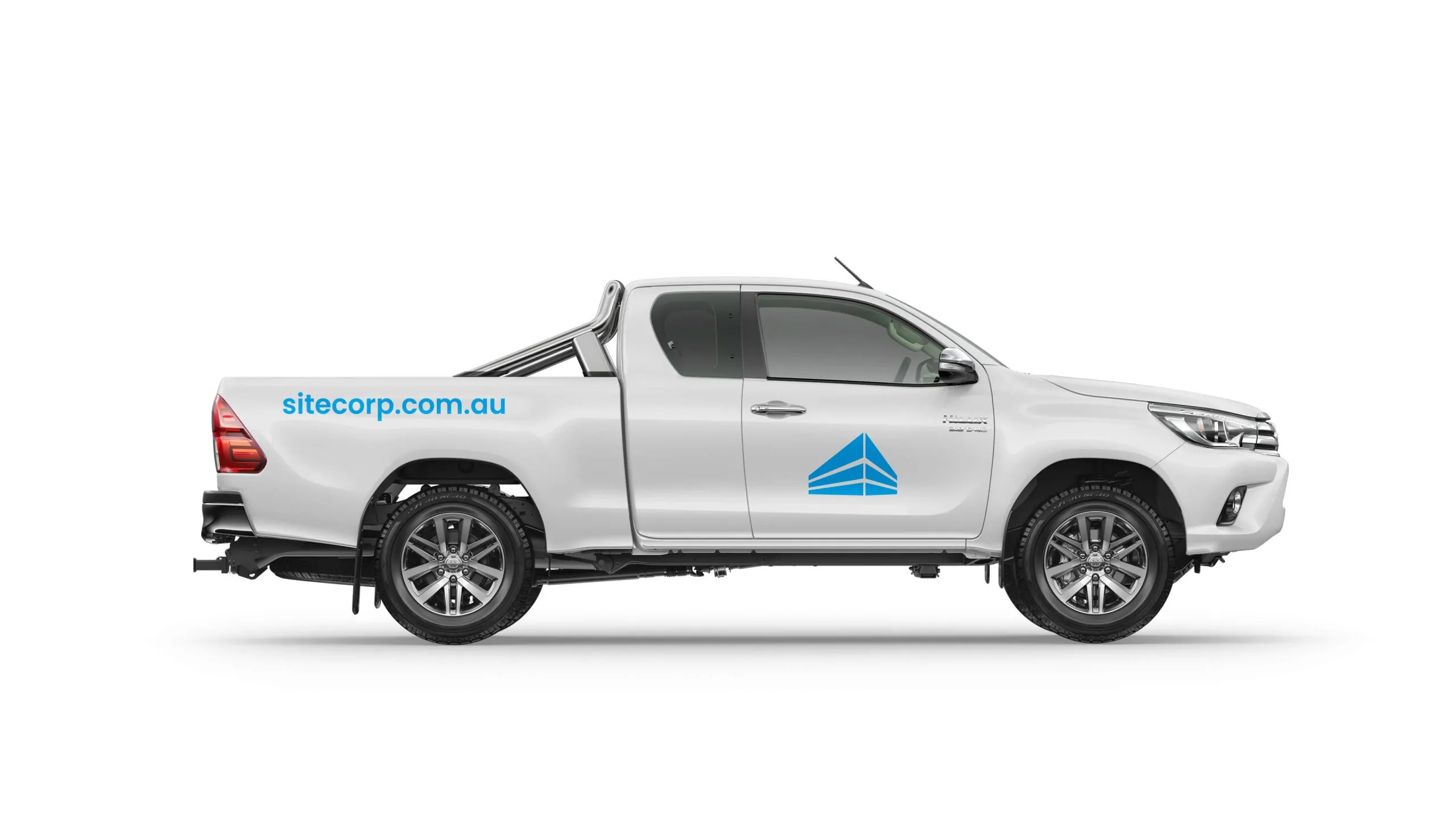 White pickup truck with Sitecorp logo and "sitecorp.com.au" printed on the side.