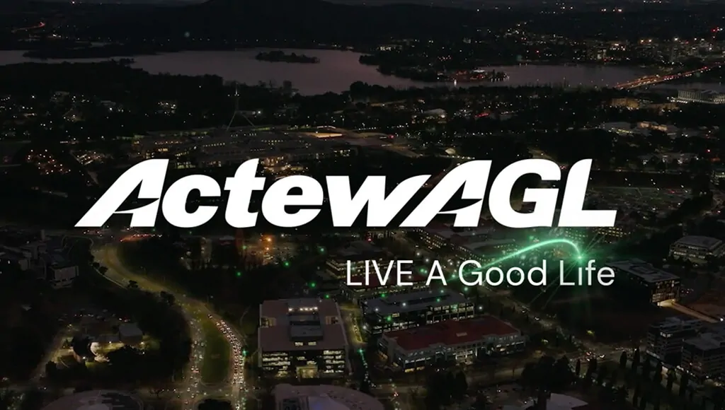 ActewAGL logo with 'LIVE A Good Life' text over a nighttime cityscape.